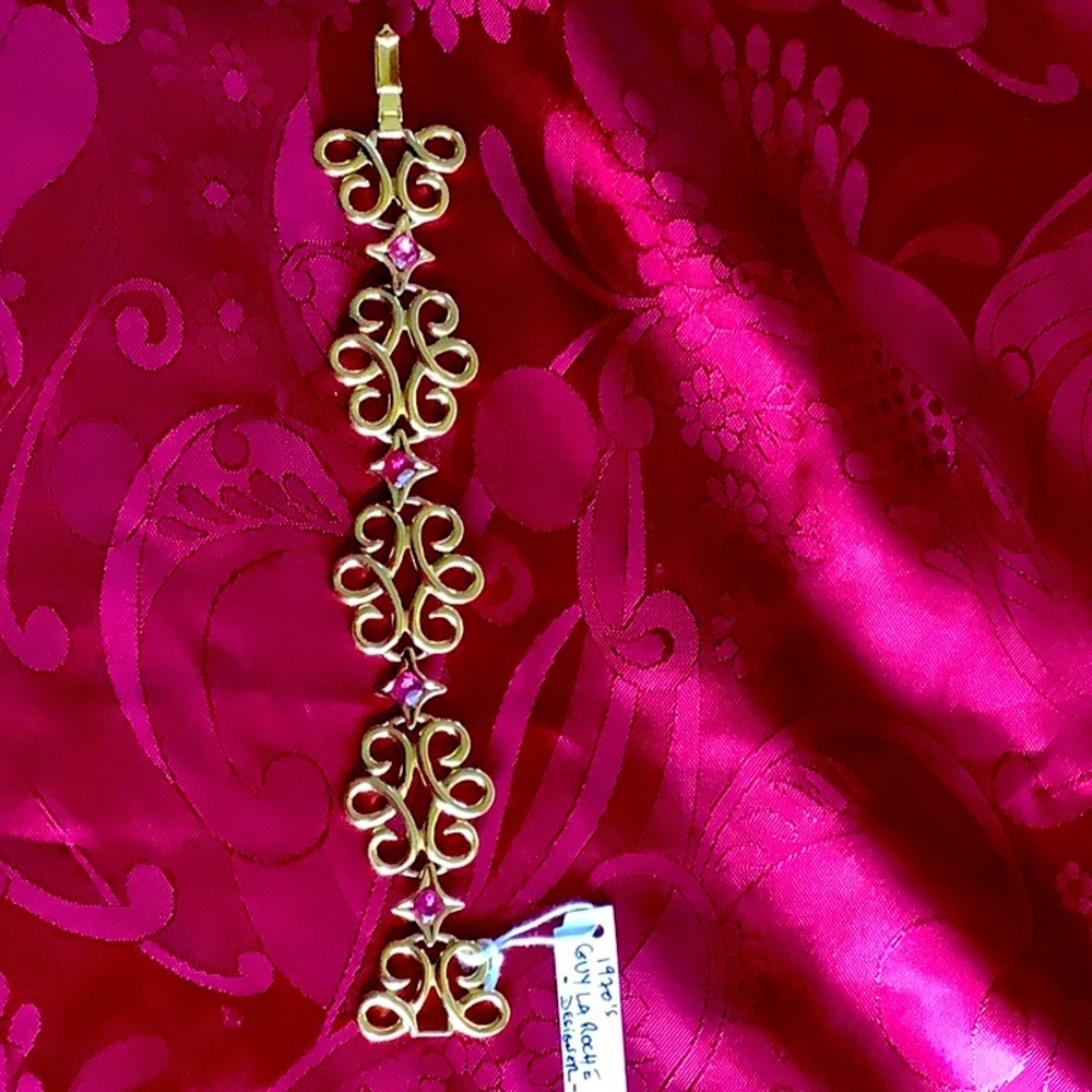 Guy La Roche Designer Gold tone Bracelet with Pink Rhinestones.